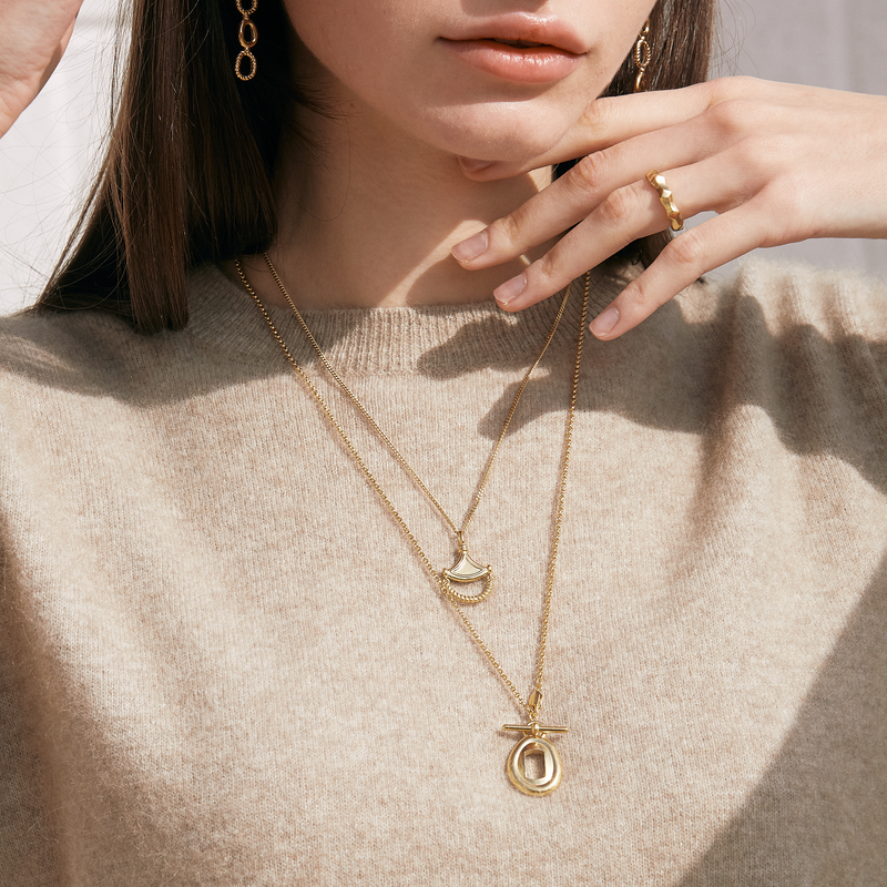 Model wearing Moyoura Key Hole Pendant Gold Necklace layered look