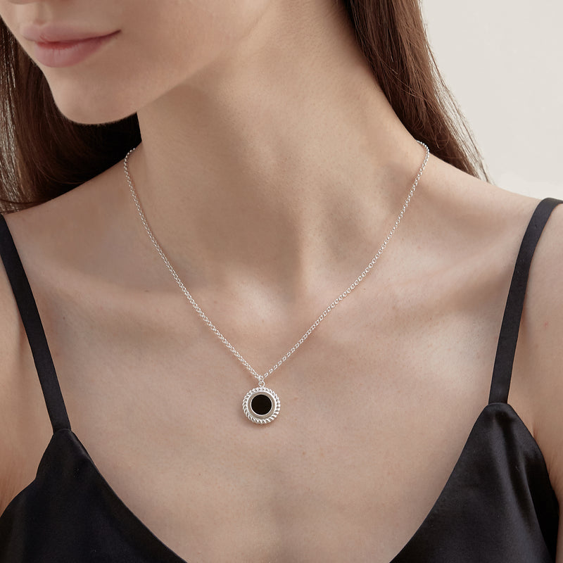 Model wearing Moyoura Onyx Circle Silver Necklace
